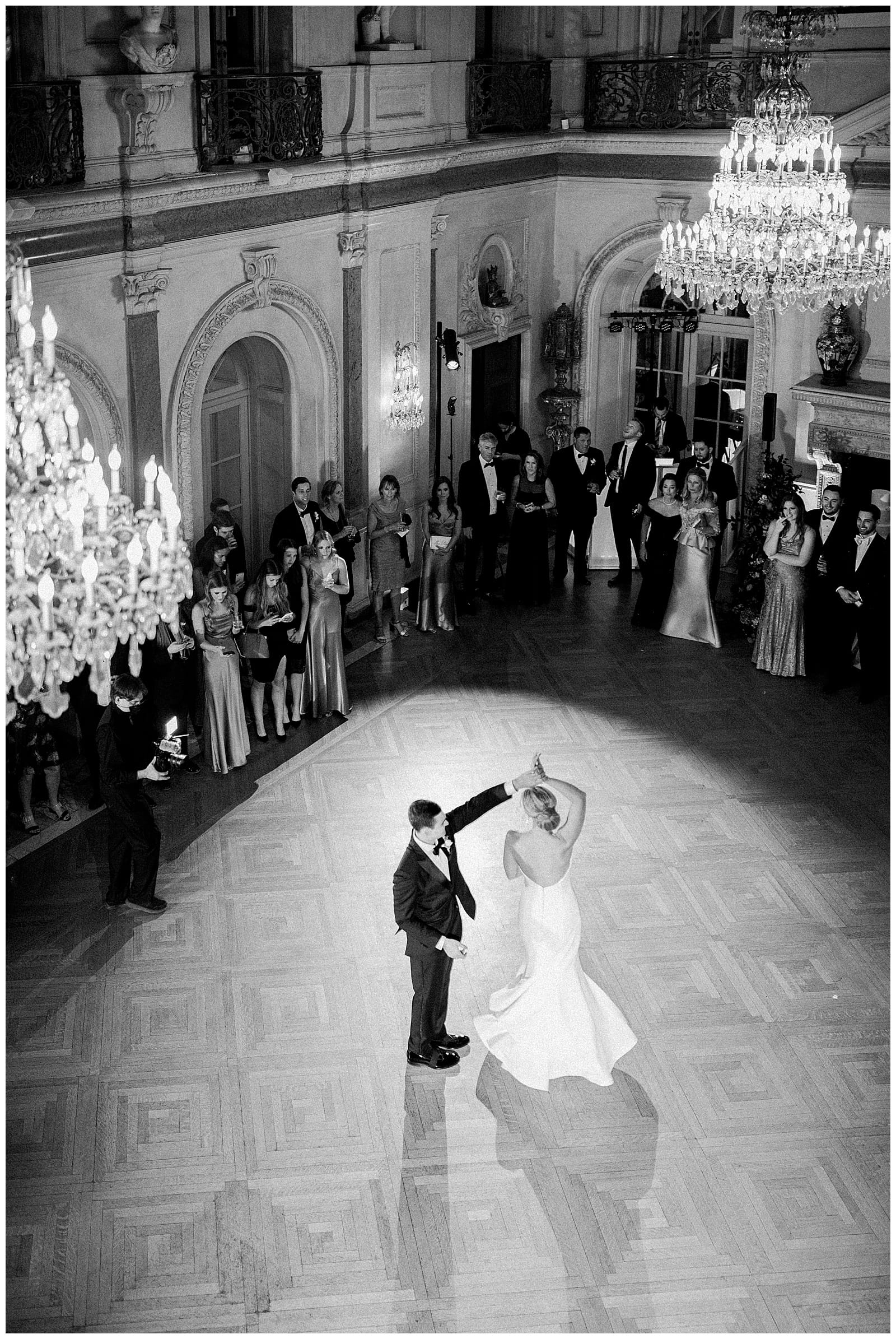 Image of bride and groom sharing their first dance inside the ballroom at the Anderson House in Washington DC