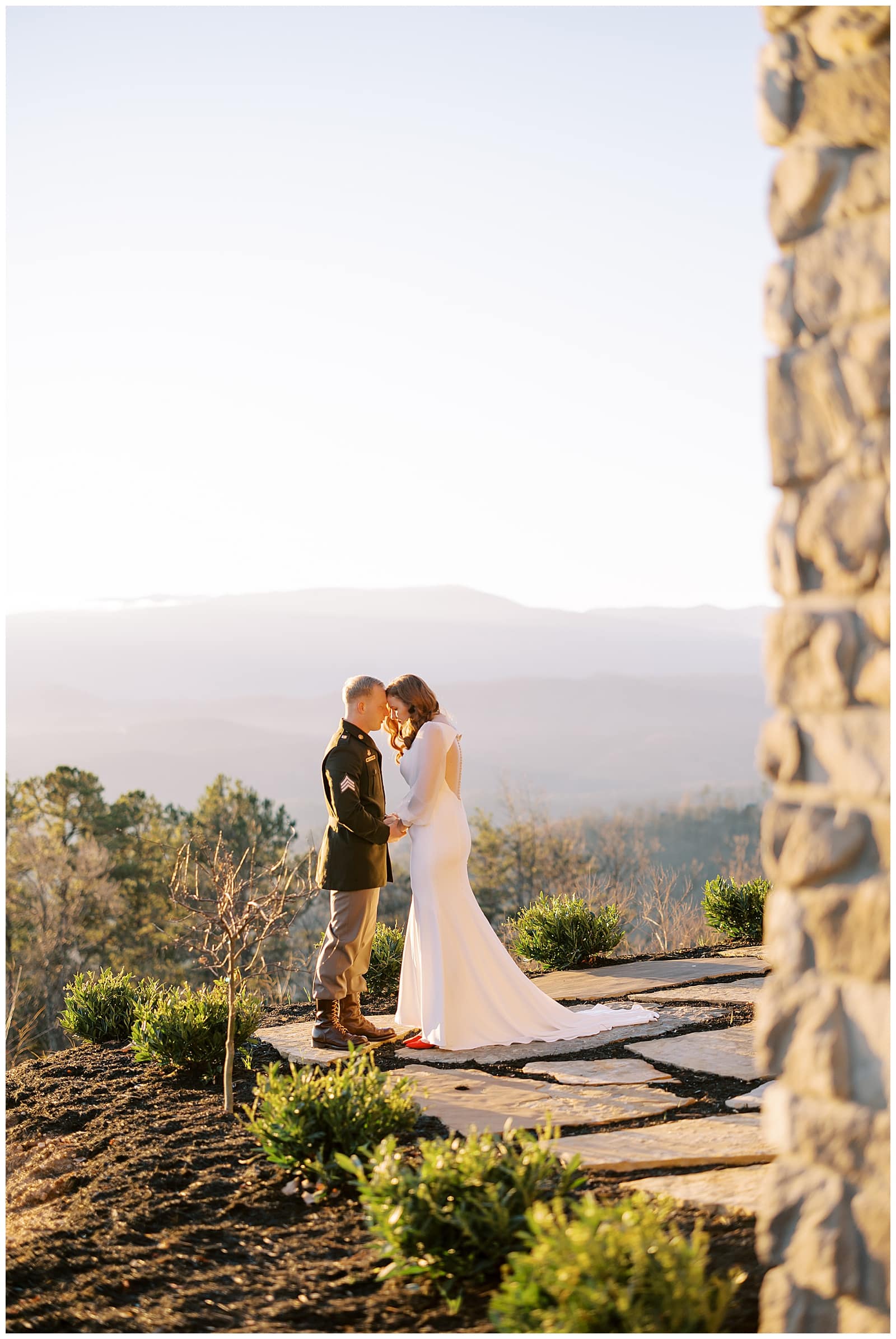 Bride and Groom outside during sunrise with the Smoky Mountains in the background
